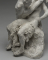 Assemblage : Faunesse assise riant et Persée