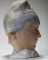 Tête de Camille Claudel au bonnet