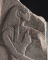 Fragment de bas-relief : femme assise tournée vers la droite