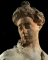 Marie Fenaille, buste drapé, la tête relevée, sur gaine à rinceaux