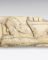 Fragment de relief : personnage portant un panier de fruits