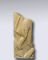 Fragment de relief : partie inférieure d'un corps masculin