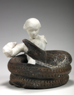 Assemblage : Torse féminin à tête de Femme au chignon, et serpent lové
