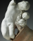 Assemblage : Couple enlacé dans un vase biconique