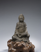 Guanyin (Kouan-Yin) assise avec enfant sur les genoux