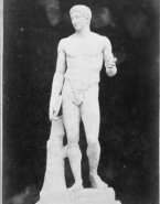 Statue antique d'athlète tenant un disque