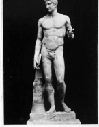 Statue antique d'athlète tenant un disque