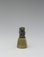 Figurine de cynocéphale assis
